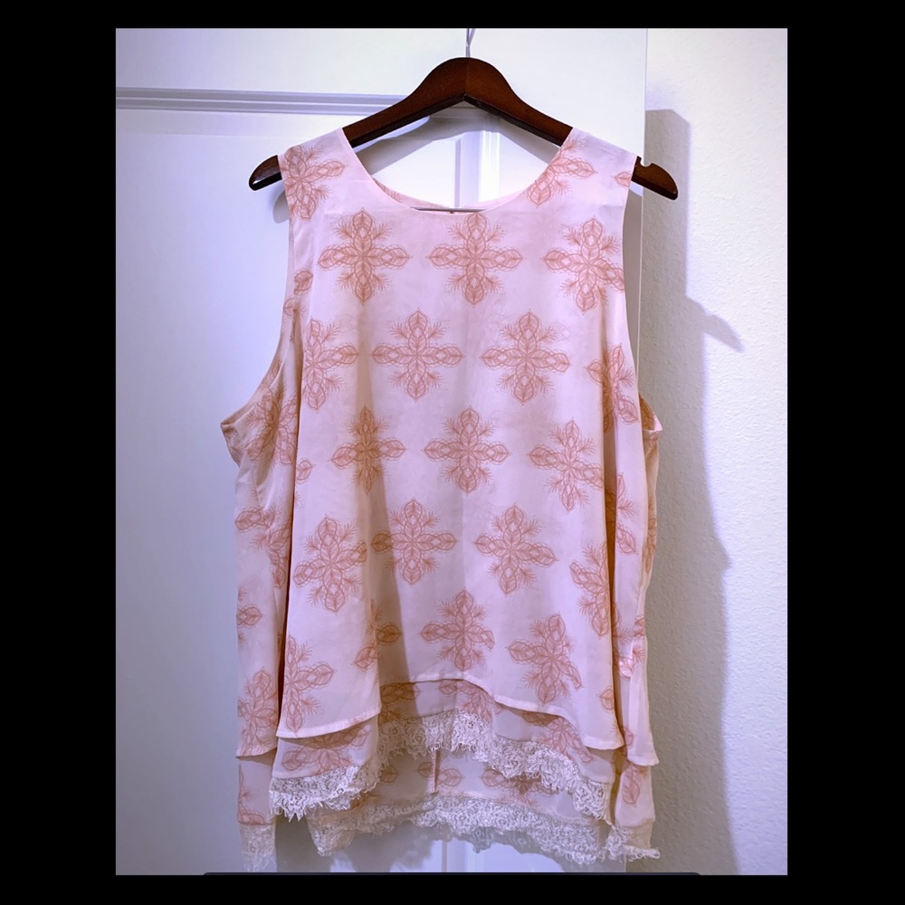 Sleeveless two tiered blouse with lace bottom